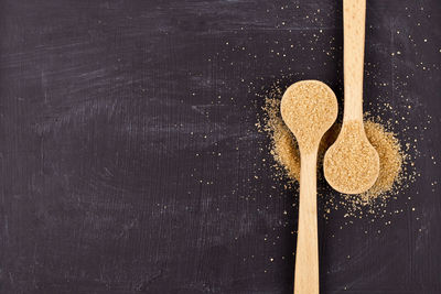 Directly above shot of wooden spoons on table