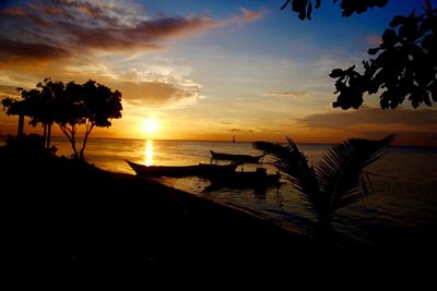 Scenic view of sea at sunset