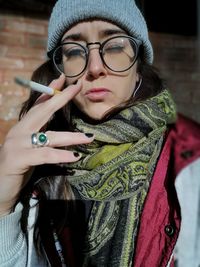 Portrait of young woman with eyeglasses