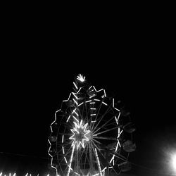 Firework display at night