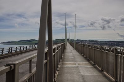 Diminishing view of bridge across river