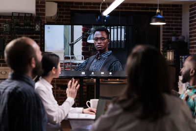 Coworkers having business meeting at office