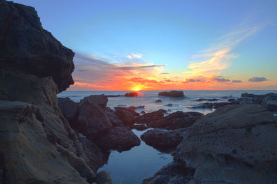 Scenic view of sea against sky during sunset