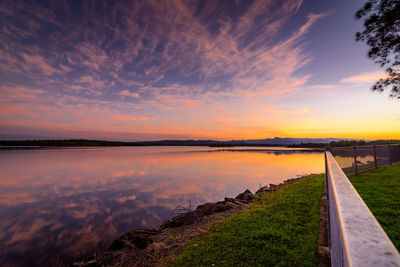 Scenic view of bridge against sky during sunset