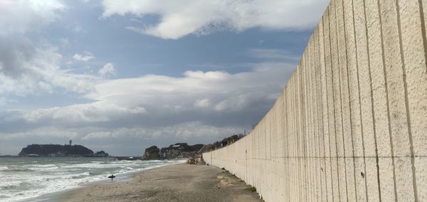 Scenic view of beach against sky