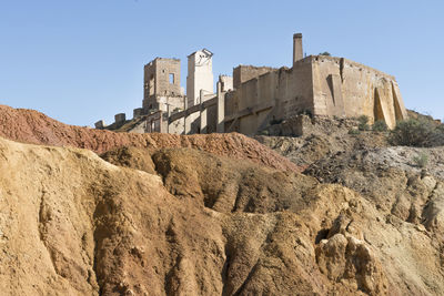 Low angle view of historic building against sky