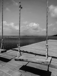 View of swing against sky