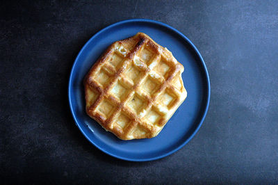 High angle view of waffle served on table