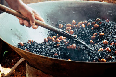 Close-up of person preparing food