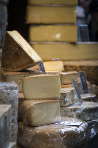 Stack of cheese at market