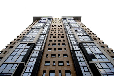 Low angle view of modern building against clear sky