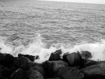 Waves splashing on rocks