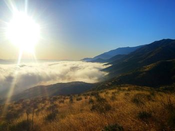 Scenic view of landscape against sky during sunset