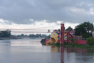 View of bridge over river against sky