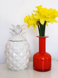 Close-up of vase against white background