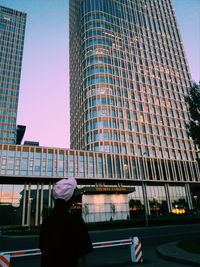 Low angle view of modern skyscraper against clear sky