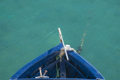 Boat in sea against blue sky