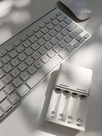 High angle view of computer keyboard on table