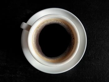 Close-up of black coffee on table