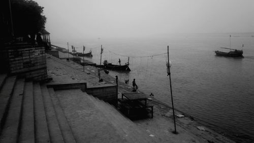 Boats on sea against sky