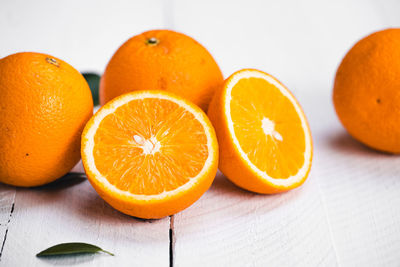 Close-up of orange fruits on table