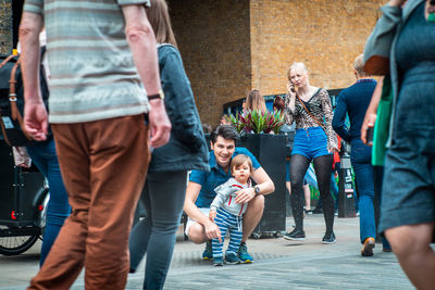 People on street in city