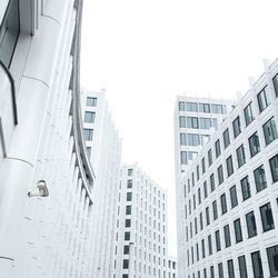 Low angle view of modern buildings in city