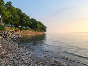 Rocky shore beach along lake erie at dusk