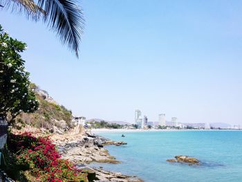 Scenic view of bay against clear sky