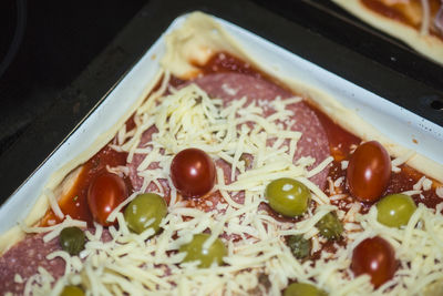 Close-up of pizza served in plate