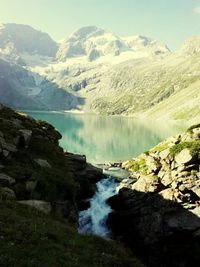 Scenic view of landscape with mountain range in background