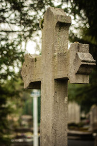 Stone cross in cemetery