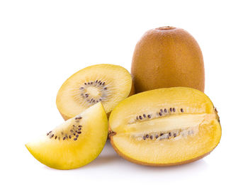 Close-up of kiwi against white background