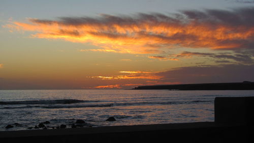 Scenic view of sunset over sea