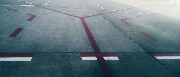 High angle view of road markings on airport runway