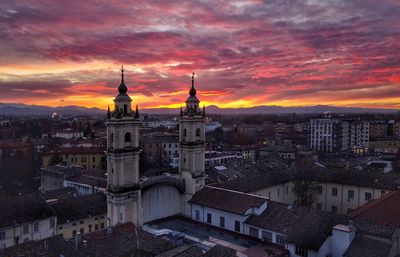 Cityscape against sky during sunset