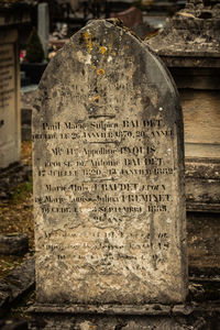 Close-up of old cross in cemetery