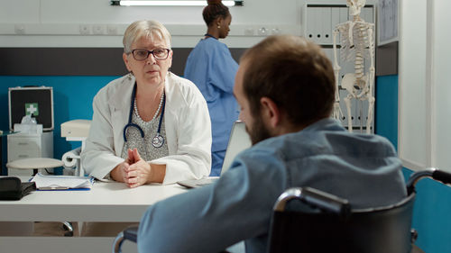 Female doctor working in hospital