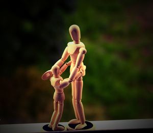 Close-up of stuffed toy on wood