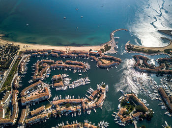 High angle view of city by sea