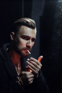 Portrait of young man looking away