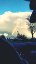 Rainbow seen through car windshield