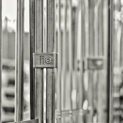 Close-up of locked glass door