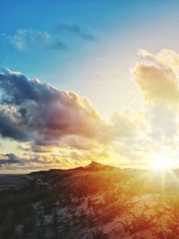 Scenic view of landscape against sky during sunset