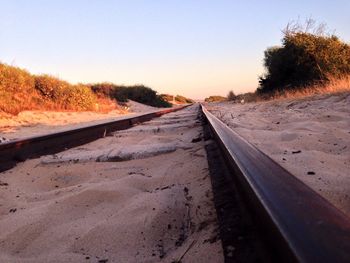 Railroad tracks against sky