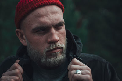 Close-up portrait of man looking away