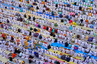 Devotion. thousands and thousands muslims people are doing their holy prayer during eid.