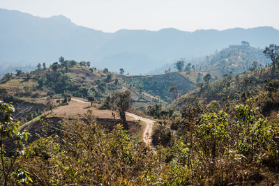 High angle view of landscape and mountains against sky