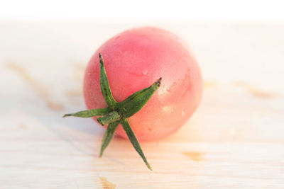 Close-up of tomato on table