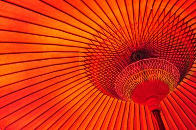 Low angle view of red umbrella